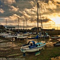 Buy canvas prints of Stormy Sunset over Aberaeron Harbour by Martin Day