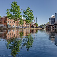 Buy canvas prints of Reflections in the canal basin by Neil Porter