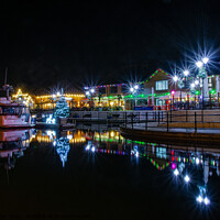 Buy canvas prints of Sovereign Harbour night lights by Fiona Etkin