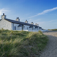 Buy canvas prints of Pilot's Cottages on Llanddwyn Island by Fiona Etkin