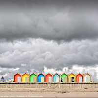 Buy canvas prints of Stormy clouds over beach huts by Lee Kershaw