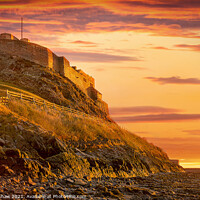 Buy canvas prints of Lindisfarne golden sunrise by Lee Kershaw