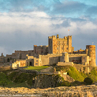 Buy canvas prints of Bamburgh Castle golden light by Lee Kershaw