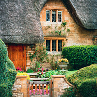 Buy canvas prints of Chipping Campden, thatched cottage by Chris Rose