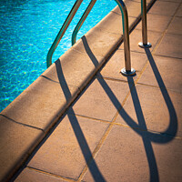 Buy canvas prints of Swimming pool ladder shadows by Chris Rose
