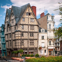 Buy canvas prints of Angers, traditional timbered buildings by Chris Rose