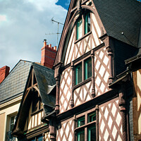 Buy canvas prints of Angers, traditional timbered buildings by Chris Rose