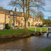 Buy canvas prints of Lower Slaughter, idyllic riverside cottages by Chris Rose