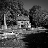 Buy canvas prints of Cotswold cottage and war memorial by Chris Rose