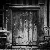 Buy canvas prints of Weathered wooden door by Chris Rose