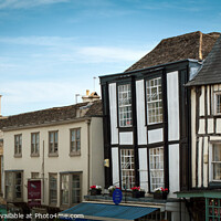 Buy canvas prints of Cotswolds architectural diversity in Burford by Chris Rose