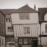 Buy canvas prints of Norwich, Crooked old half-timbered bu by Chris Rose
