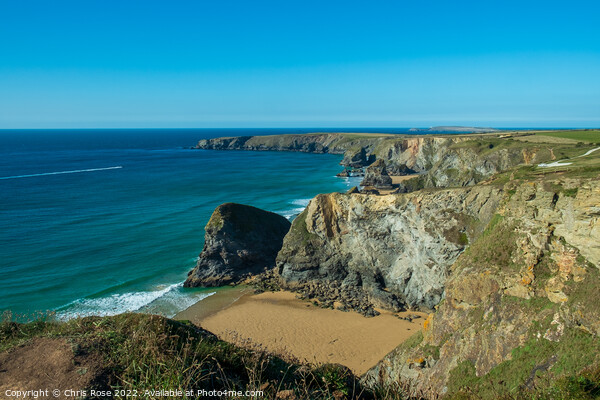 Bedruthan Steps in summer sunsine Picture Board by Chris Rose