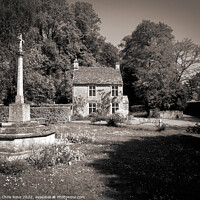 Buy canvas prints of Cotswolds cottage and war memorial by Chris Rose