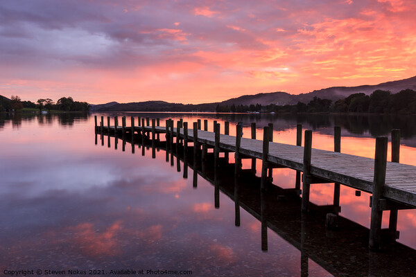 Serene Sunset Reflected on Coniston Water Picture Board by Steven Nokes