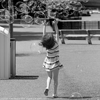 Buy canvas prints of Girl and Bubbles by Phil Robinson