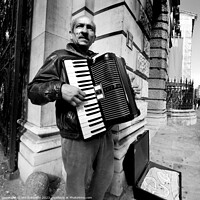 Buy canvas prints of Accordion player, Piccadilly by Phil Robinson