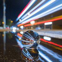 Buy canvas prints of Lensball Bus Trails With Reflections by Stephen Coughlan