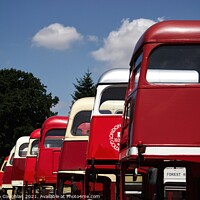 Buy canvas prints of A line of different double decker buses by Stephen Coughlan