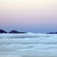 Buy canvas prints of Cuillin Hills above the Clouds by Jon Pear