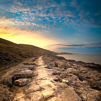 Buy canvas prints of Sunrise Heritage Coast, South Wales by Simon Connellan