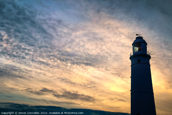 Sunset on Nash Point Lighthouse  Picture Board by Simon Connellan