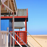 Buy canvas prints of Norfolk Beach Huts by Laura Baxter