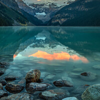 Buy canvas prints of Dramatic Sunrise at Lake Louise by Pierre Leclerc Photography