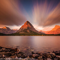 Buy canvas prints of Dramatic Sunrise In Glacier National Park by Pierre Leclerc Photography