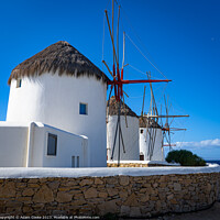 Buy canvas prints of The Windmills of Mykonos | Greece by Adam Cooke