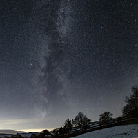 Buy canvas prints of Milky Way above a quiet Swaledale village by Paul Clark