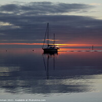 Buy canvas prints of Yacht caught in the sunset by Ian Cramman