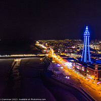 Buy canvas prints of Blackpool Promenade and Tower from the air at night by Ian Cramman