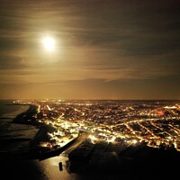 Buy canvas prints of Full Moon over Whitstable Harbour by Evolution Drone