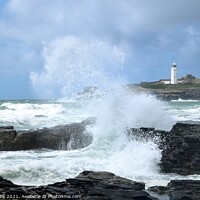 Buy canvas prints of Godrevy lighthouse splash. by Roy Curtis