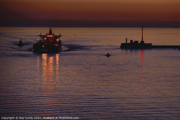Leaving Port on the Evening Tide. Picture Board by Roy Curtis