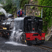 Buy canvas prints of Steam train at the station by Jim Butler