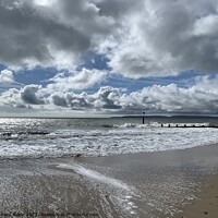 Buy canvas prints of Dramatic skies at the beach  by Richard Baker