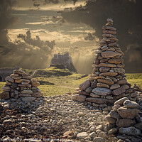 Buy canvas prints of Holy Island rock piles by Duncan Spence