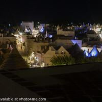 Buy canvas prints of Alberobello at night by Duncan Spence