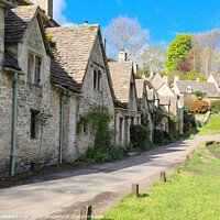 Buy canvas prints of Cottage row at Bibury by Elisabeth Lucas