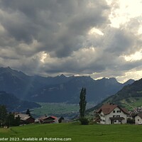 Buy canvas prints of Sunlit Sky over the Swiss Alps by Elaine Anne Baxter