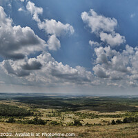 Buy canvas prints of Cloudy sky over vast fields by Viktoriia Novokhatska