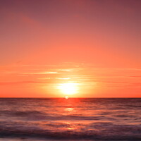 Buy canvas prints of Sunrise over the sea. by Drew Watson