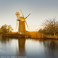 Buy canvas prints of Serene Sunrise Over Turf Fen Mill by Terry Newman