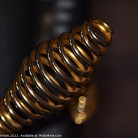 Buy canvas prints of Golden Coil Woodstove Handle A by Philip Lehman