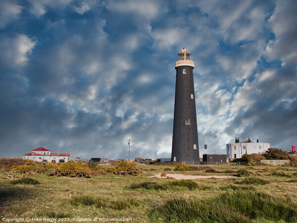 Dungeness Lighthouses under moody skies. Picture Board by Mike Hardy