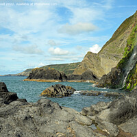 Buy canvas prints of Rocks and waterfall at Tresaith by Paul Daniell