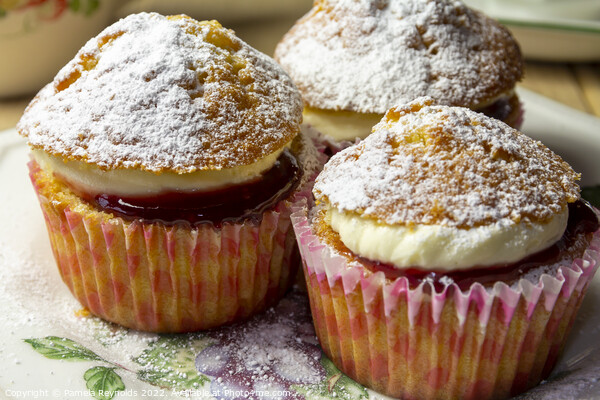 Three Cupcakes on a side plate Picture Board by Pamela Reynolds