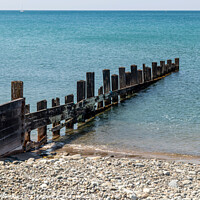 Buy canvas prints of Breakwater at Barmouth North Wales by Pamela Reynolds